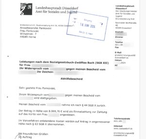 Abhilfebescheid_Erstatt_8000_Dues